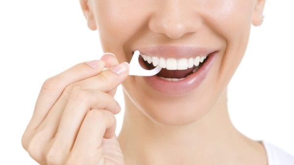 Cách dùng chỉ nha khoa 5